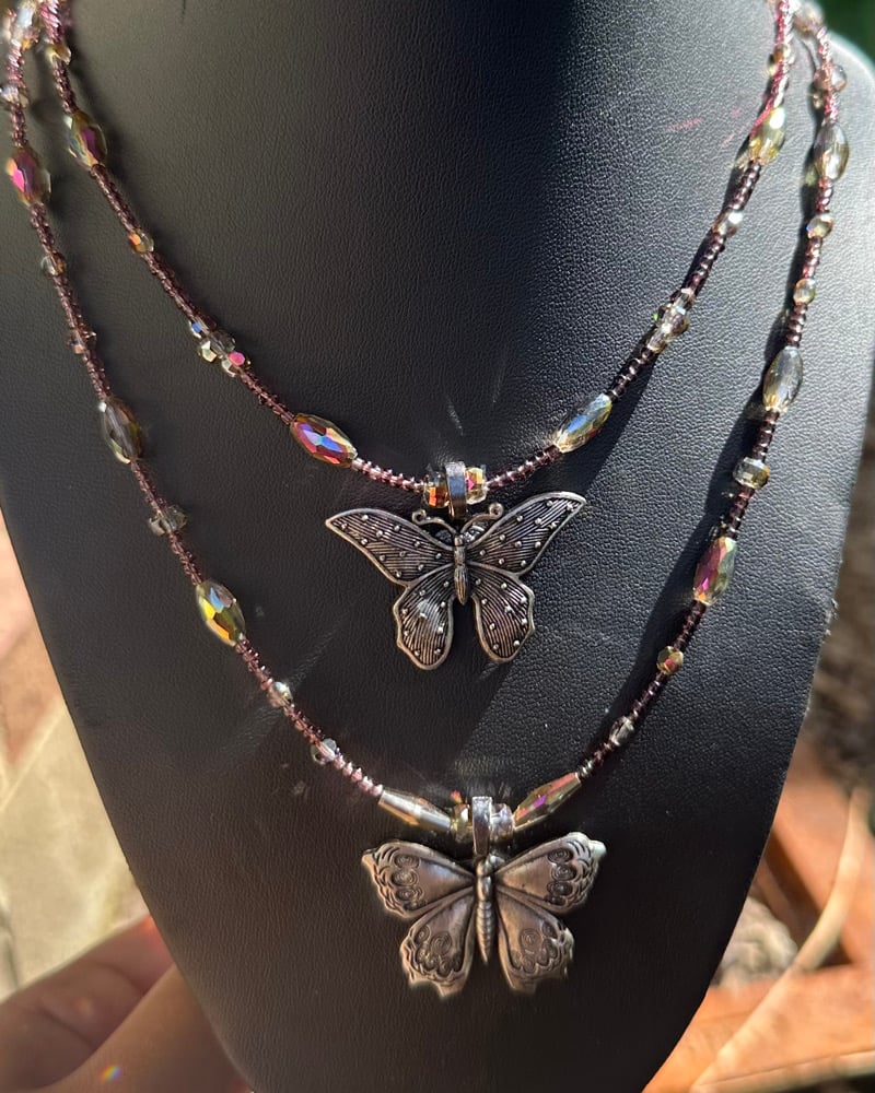 Image of aura butterfly necklaces