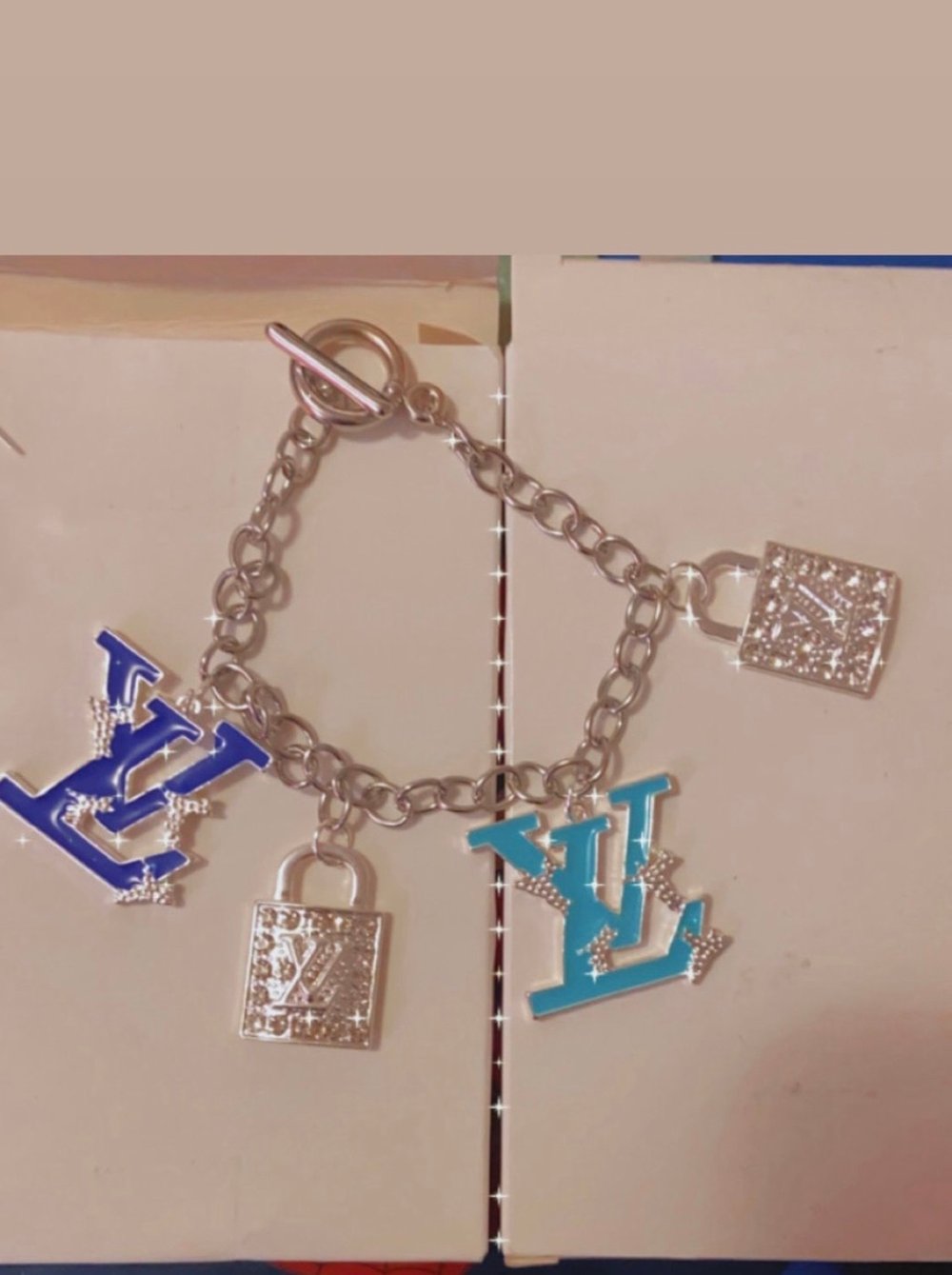 Image of Pink or blue designer Inspired louis vuitton charm bracelet 