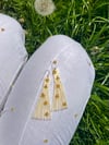 Silvestres in a creamy dress