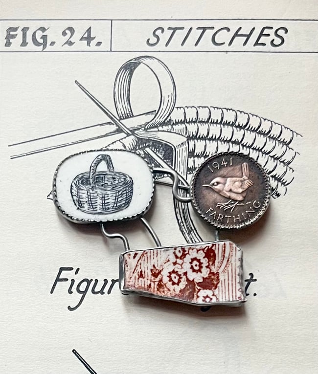 BASKET AND FIELD FINDS BROOCH