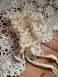Image 3 of Antique Beige Lace Newborn Bonnet Silk Tie