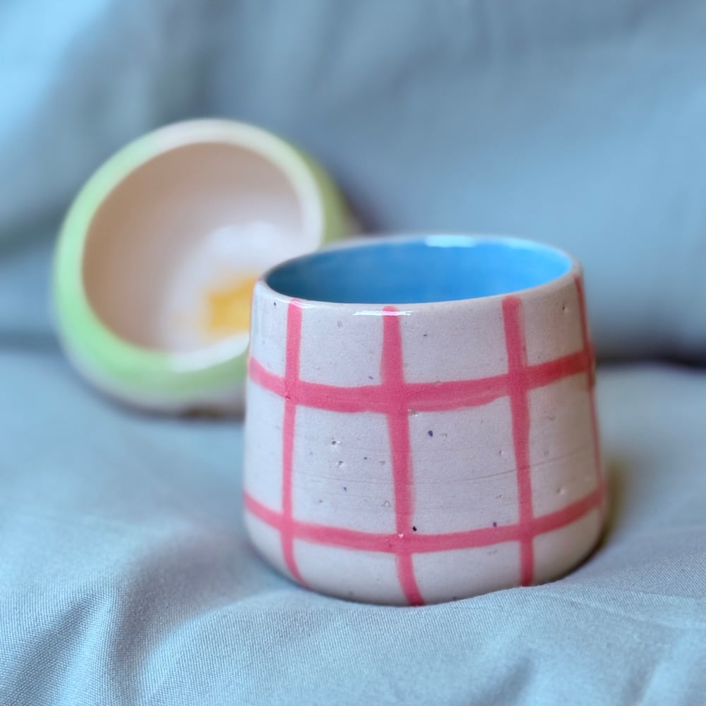 image of pink grid cup