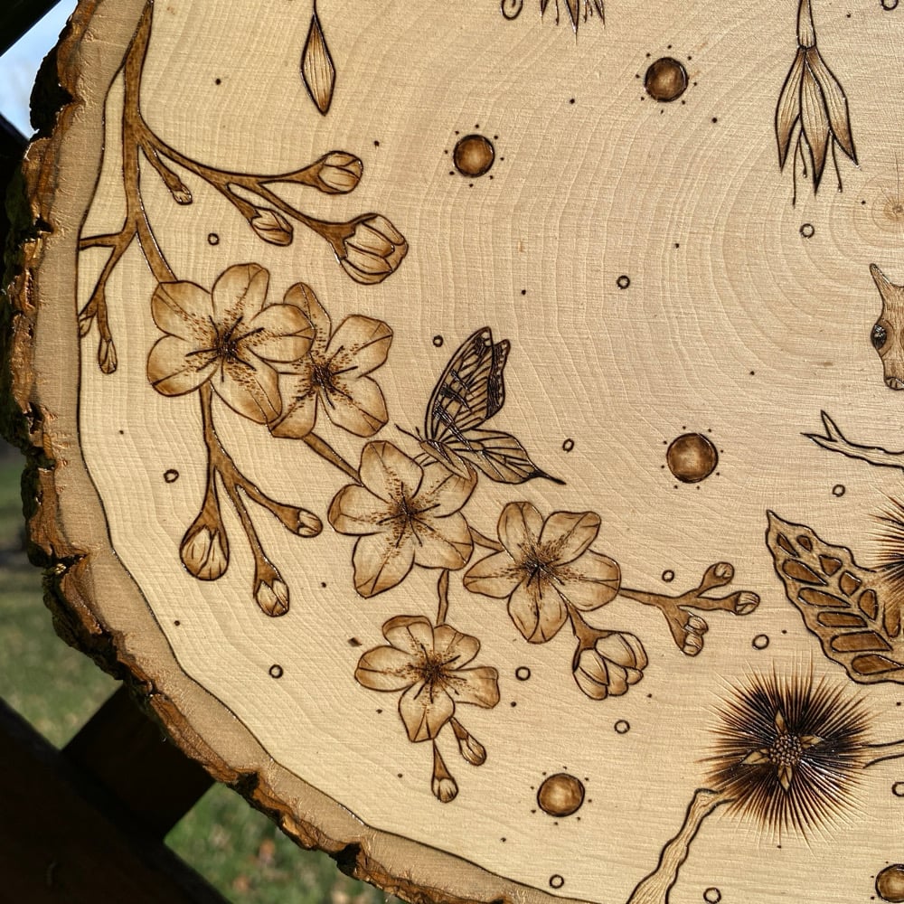 Image of life in the leaves wood art