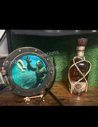 Image 1 of The Lurker Beneath Porthole Light Up Purse 