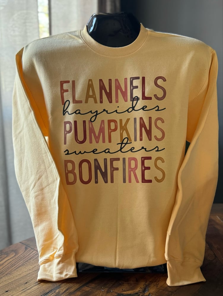 Image of Flannels Hayrides Pumpkins 