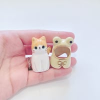 Image 4 of Orange cat with frog ponchos coat ceramic figurine