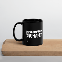 Image 2 of Unfortunately Human Black Glossy Mug