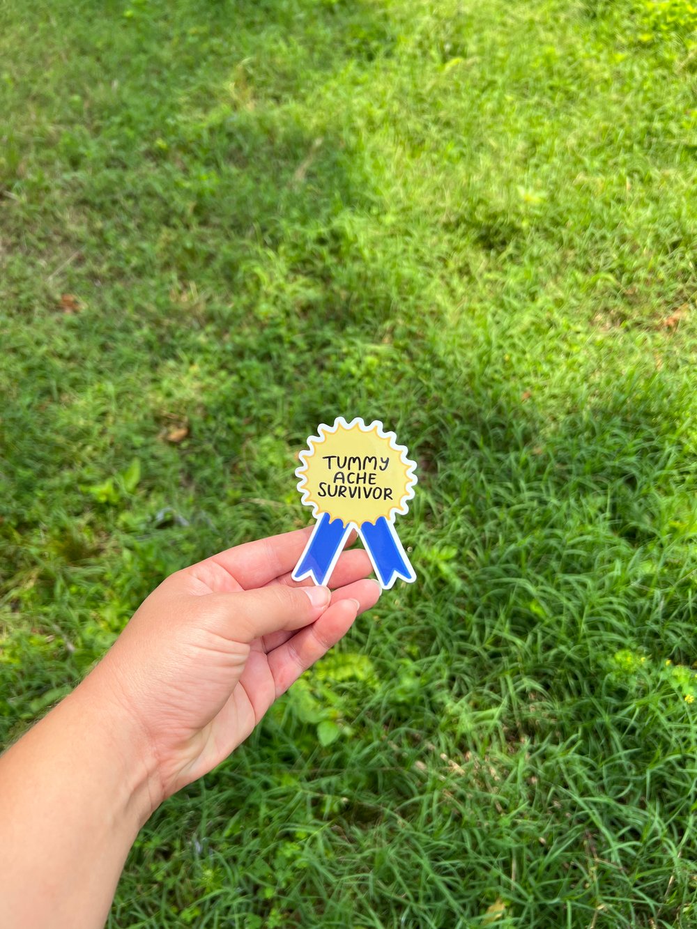 Image of tummy ache survivor blue ribbon 