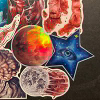 Image 4 of “We’re made of stars” holographic artwork sticker 