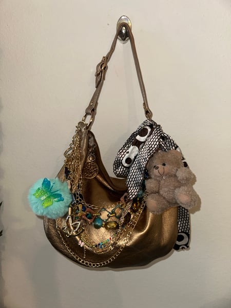 Image of Coach all gold purse 