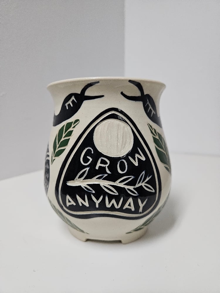 "grow anyway" snake planter (6)