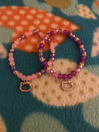 Image 1 of Hello kitty bracelets 💖💜