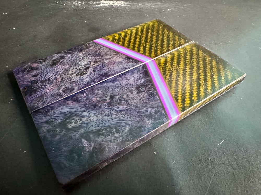 Image of @Kaoticartworks 3-D Resin & Amboyna Burl GLOW Segmented Knife Scales