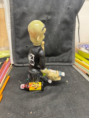 Image of Graf Can Man sculpture by DL