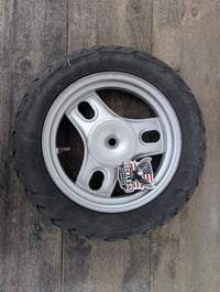 Image 1 of **GARAGE SALE ITEM Honda Metropolitan OEM Rear Wheel and Tire 