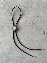 Image 1 of White Dog Bolo