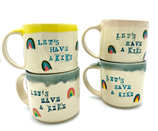 Let’s Have a Kiki Mugs