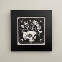 Image 2 of Flowers growing out of skull Linocut Print