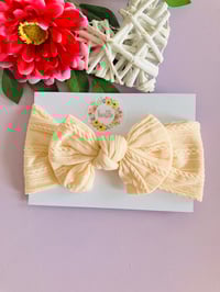 Image 1 of Peach cable headwrap 