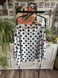 Image 1 of Polka dot top with bell sleeves