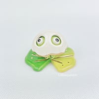 Image 2 of Sad zombie frog on lily pad with ghost mask ceramic figurine 