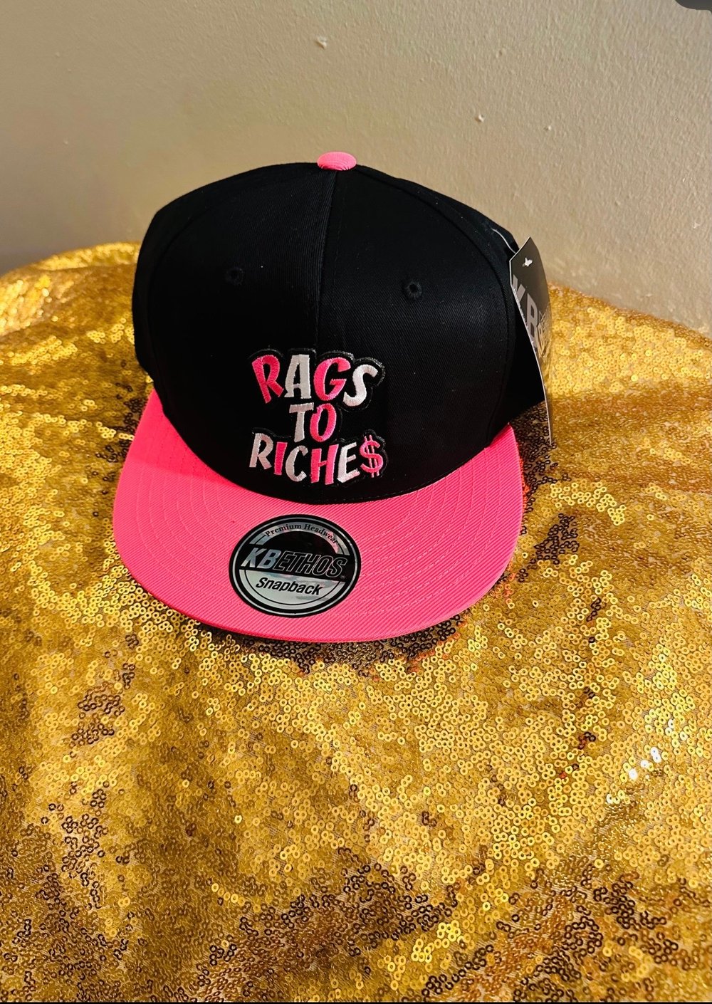 Image of Rags to riches snapback hats red letters or pink letters