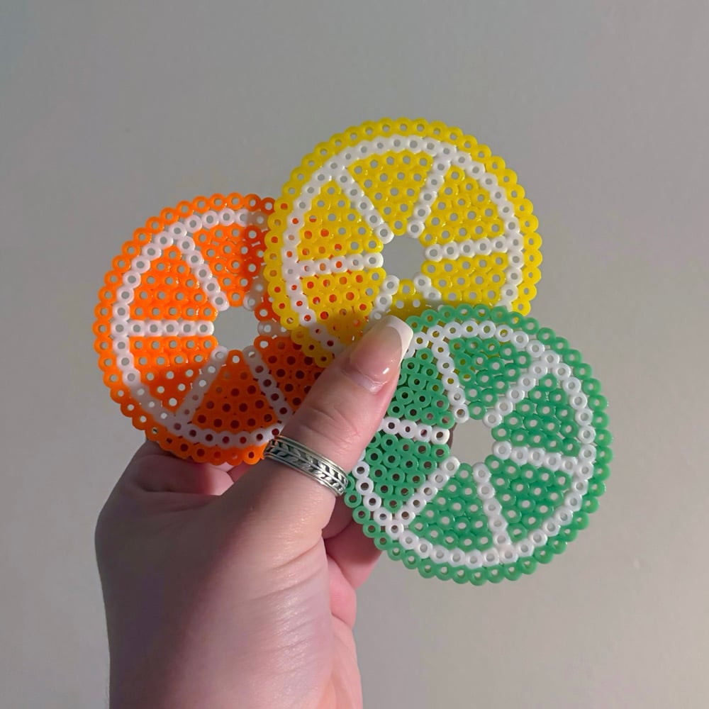 Image of fruit coasters/cup covers