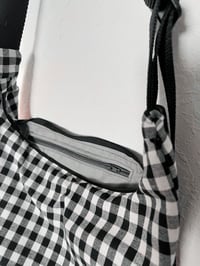 Image 4 of black and white crescent bags