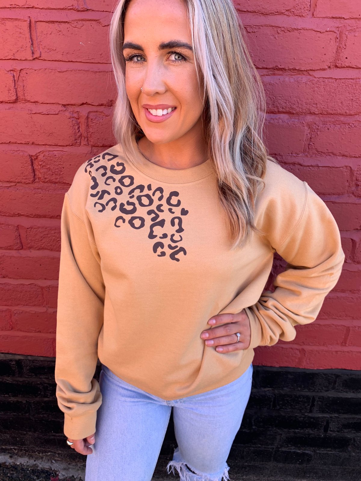 Leopard hotsell sweater boutique