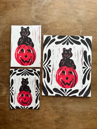 Reproduction linocut print - black cat blow mold
