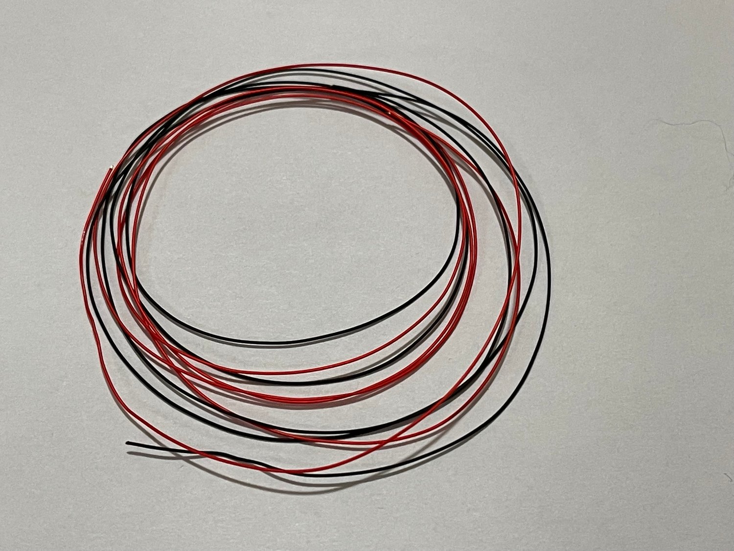 Spark plug wire material red-black