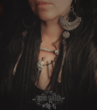 Image 1 of Long bone & copper hangers 