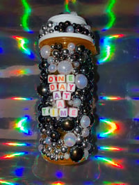 Image 1 of magik med bottles 