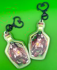 Image 2 of Drowning In Guilt Husk Key Chain