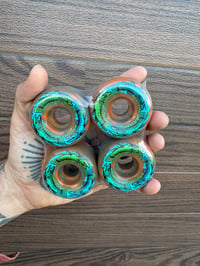 Image 1 of Orange Swirl Triple Trout 54mm Skateboard Wheels