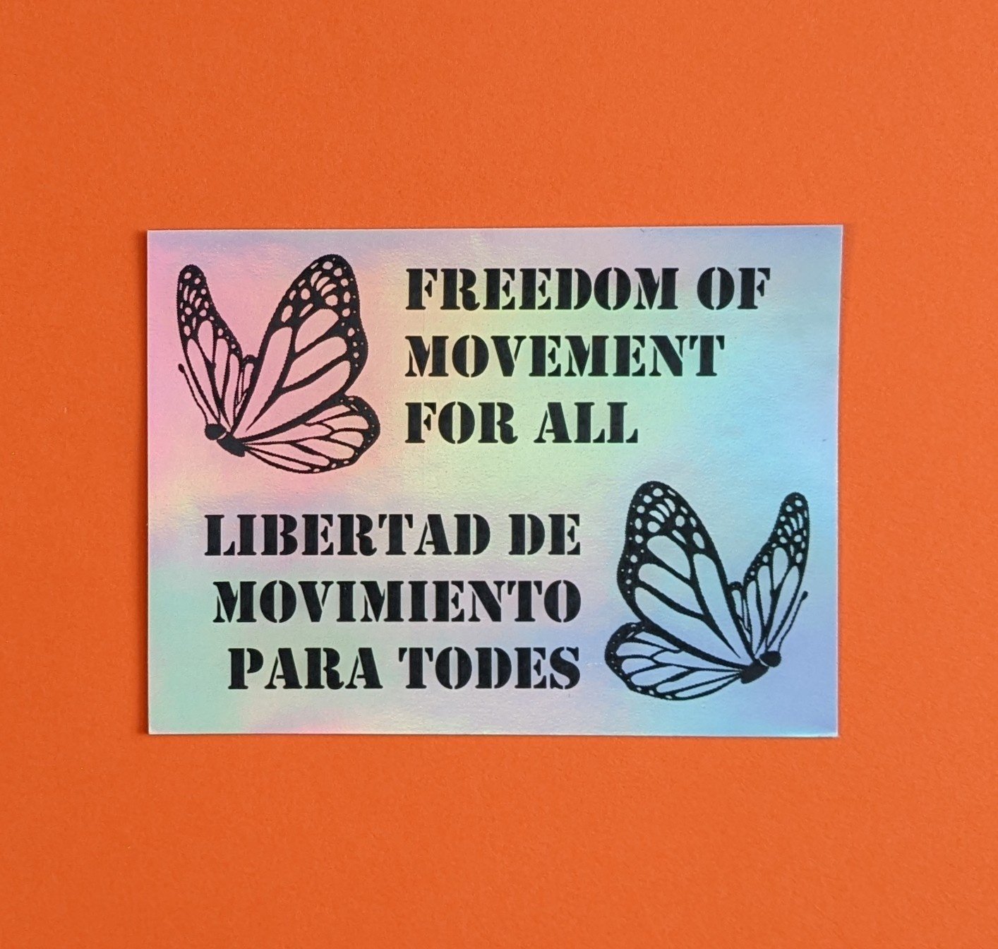 freedom of movement for all / libertad de movimiento para todes (sticker)