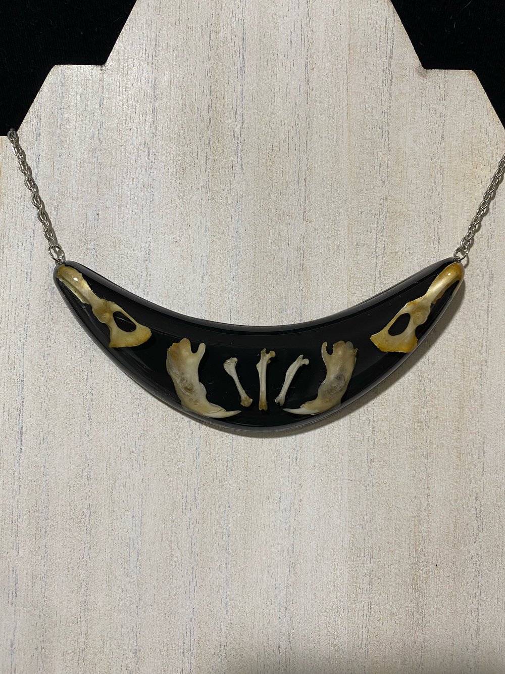 Bone bib pendant