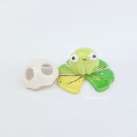 Image 1 of Silly Frog on lily pad with ghost mask ceramic figurine