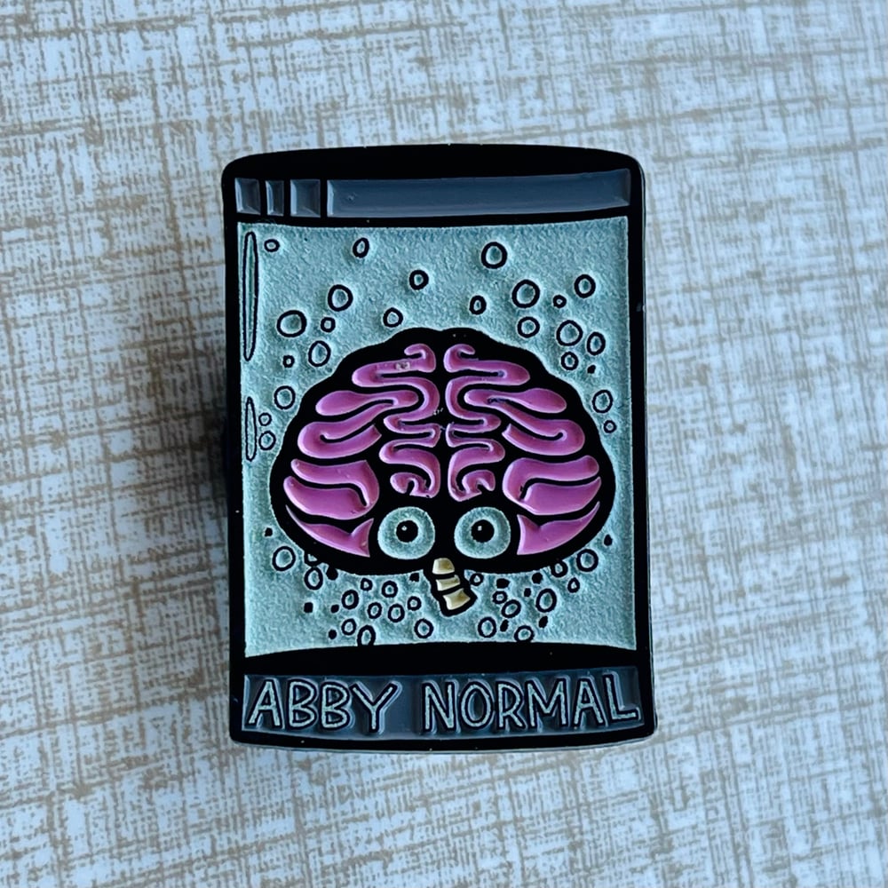 ABBY NORMAL 1.5” Glow-in-the-Dark Brain Soft Enamel Pin