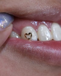Image 3 of 18k Heart-Framed Hollow Butterfly Tooth Charm