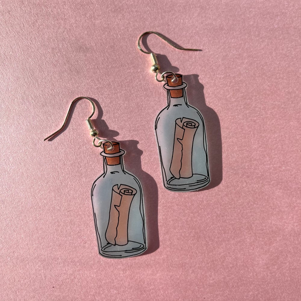 Image of message in a bottle earrings