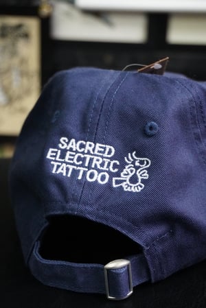 Image of peanuts skull 6 panel cap
