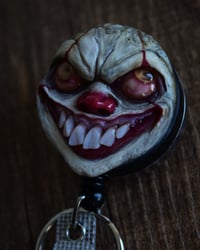 Image 7 of Handmade Pennywise Badge Reel Keychain OOAK