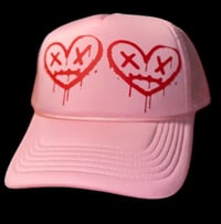 Image 1 of Two heart trucker hat