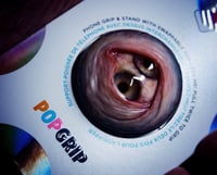 Image 2 of Custom Swappable Phone Grip for smartphones, double iris, reflective pupil, glow in the dark