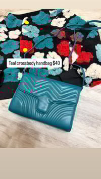 Image 1 of Teal crossbody handbag can be worn as a clutch also