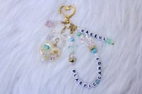 Image 2 of 'plastic candy' LOONA keychain