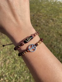 Image 1 of Spiral & peace sign bracelet stack