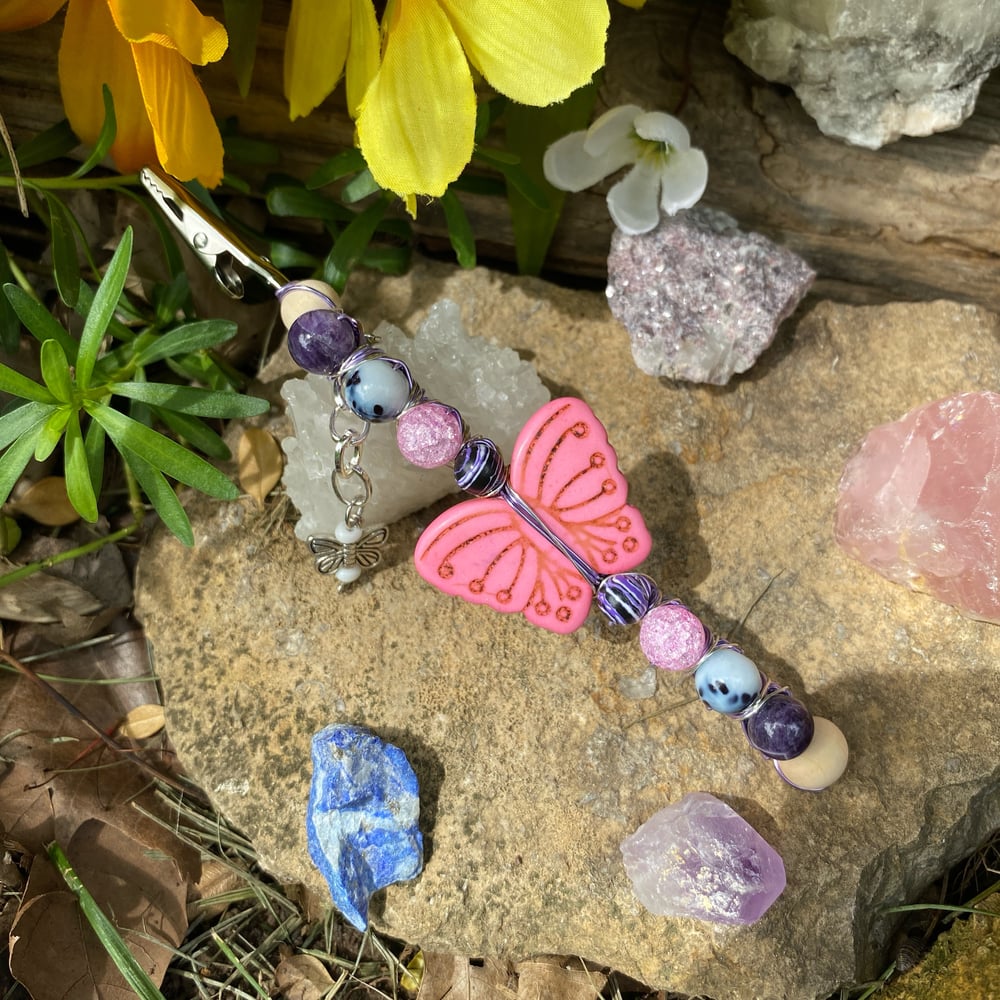 Image of pastel butterfly roach clip 