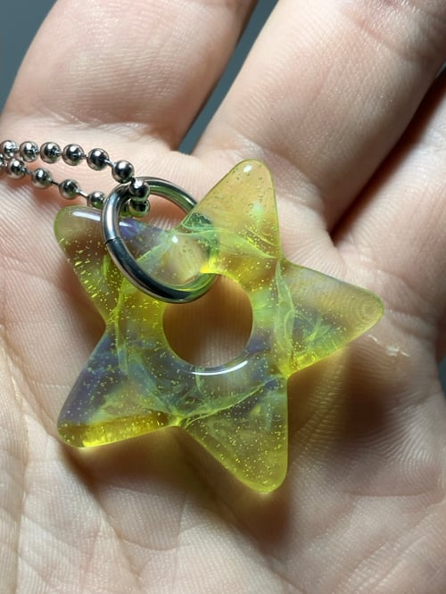 Image of silver green star